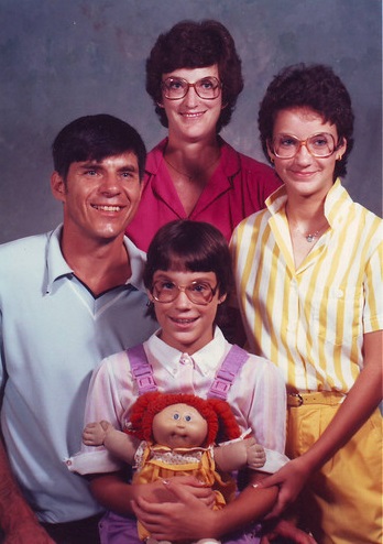 Family with Cabbage Patch Kid. Image courtesy of Bing Image search with license filter 
